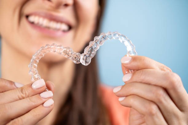 Invisible aligners for dental correction